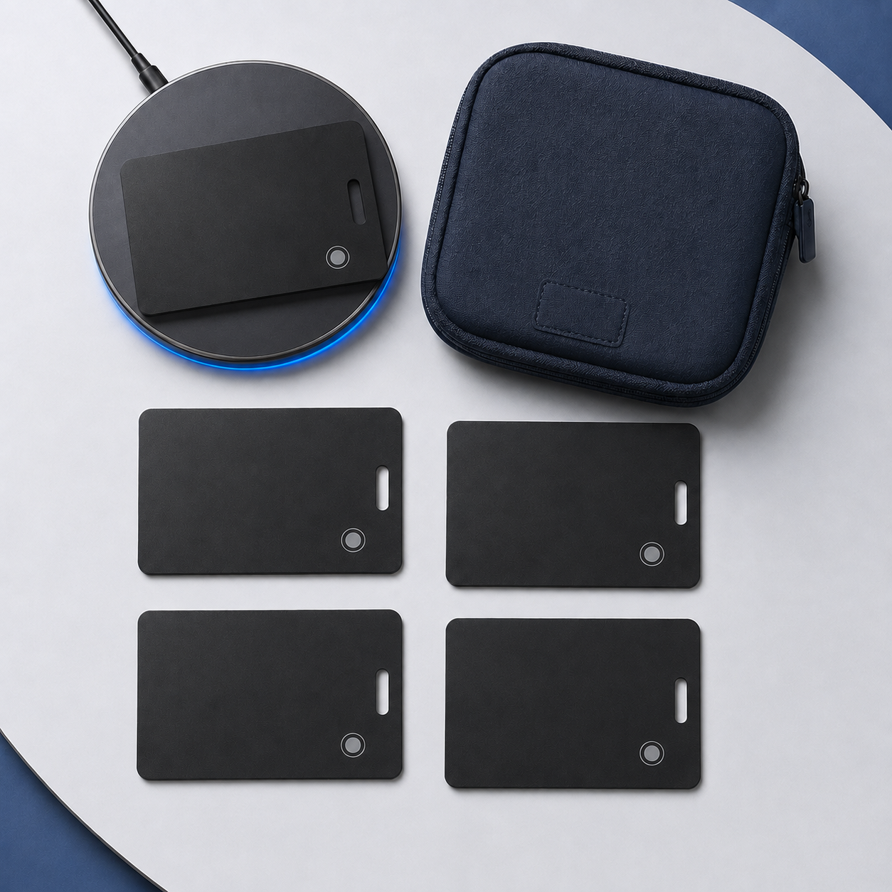 Five tracking cards with wireless charger and navy travel pouch